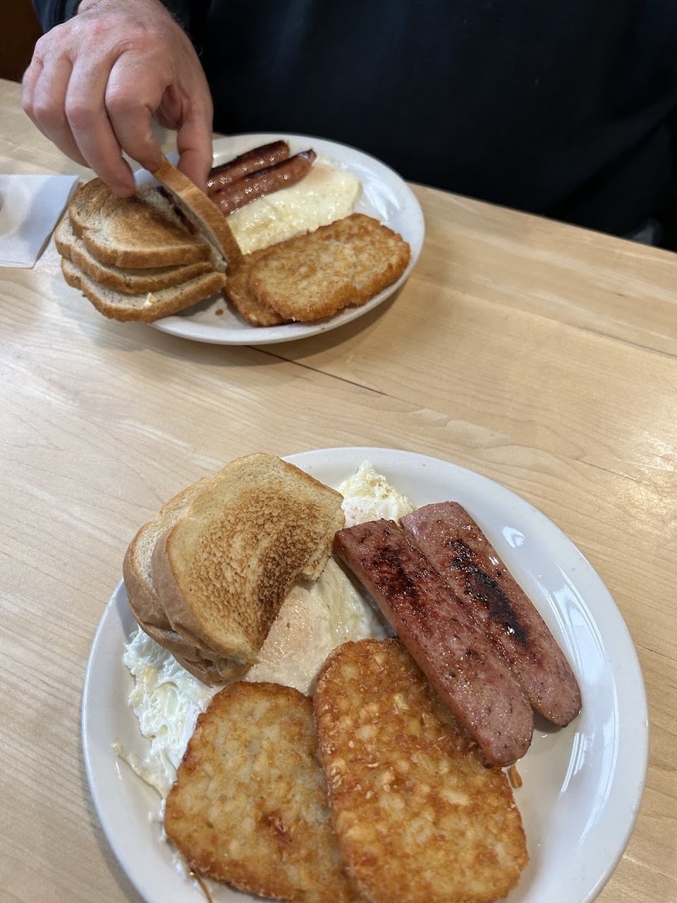 Printed diner menu with breakfast and dinner sections.