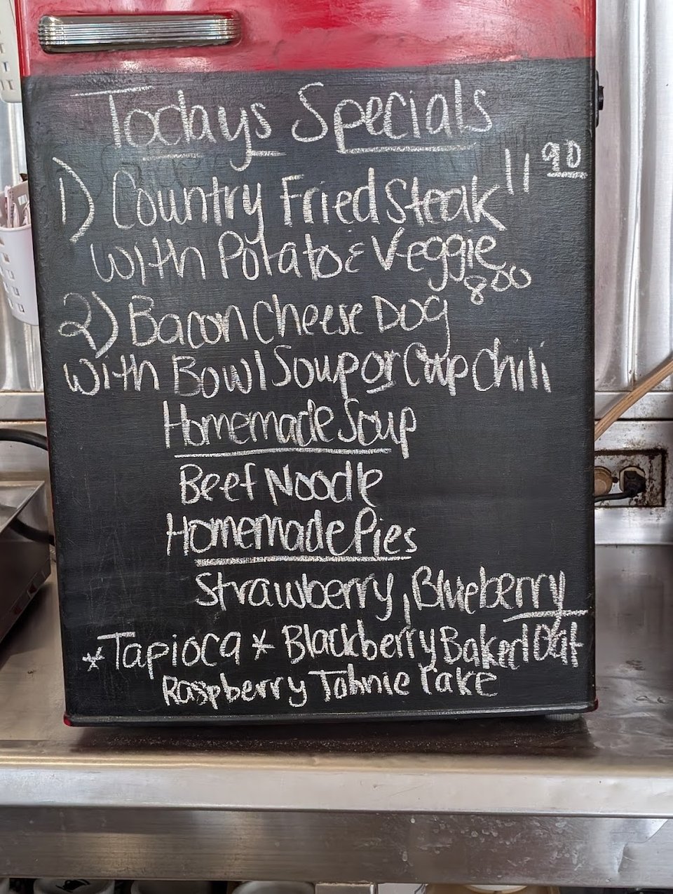 Menu page showing omelets, coffee, and homemade pie.