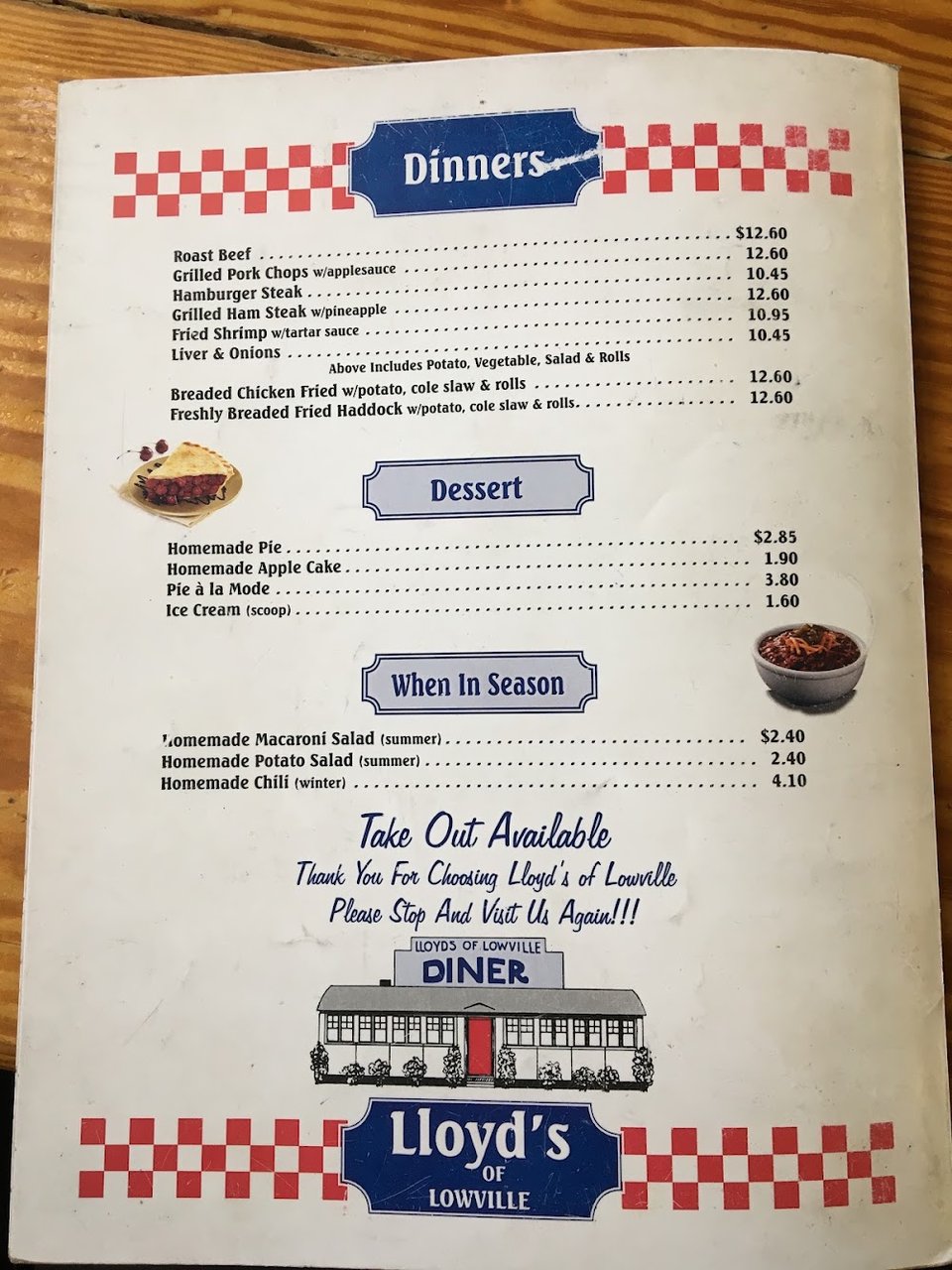 Printed diner menu with breakfast and dinner sections.